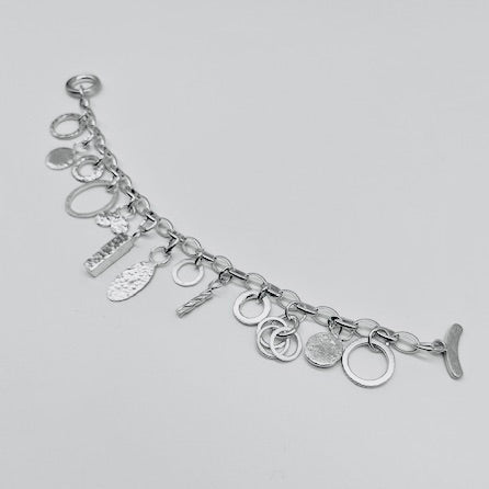 One of a Kind  Hammered Charm Bracelet