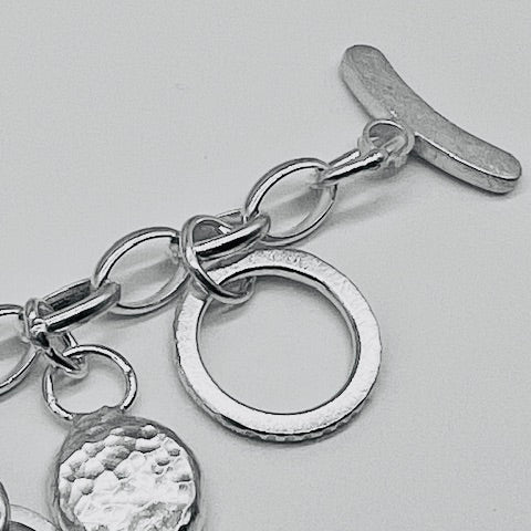 One of a Kind  Hammered Charm Bracelet